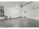 View of the garage with painted floors at 9224 W Raymond St, Tolleson, AZ 85353