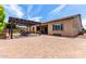 Spacious backyard featuring a brick patio, pergola, and outdoor seating, perfect for entertaining guests at 9448 W Villa Hermosa --, Peoria, AZ 85383