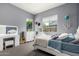 Bright bedroom with white furniture, natural light, and decor for a comfortable living space at 9448 W Villa Hermosa --, Peoria, AZ 85383