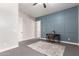 Comfortable bedroom with stylish blue accent wall, neutral walls, and gray carpet at 9448 W Villa Hermosa --, Peoria, AZ 85383