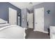 Cozy bedroom with white wainscoting, plush carpet, and adjacent spaces for added versatility at 9448 W Villa Hermosa --, Peoria, AZ 85383