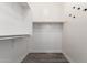 Walk-in closet with vinyl flooring and plenty of shelf and rod storage space at 9448 W Villa Hermosa --, Peoria, AZ 85383