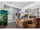 Bright open office space with hardwood floors, a chandelier, and open access to other living spaces at 9448 W Villa Hermosa --, Peoria, AZ 85383