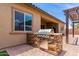 Outdoor kitchen featuring a built-in grill and stone countertop, ideal for outdoor cooking at 9448 W Villa Hermosa --, Peoria, AZ 85383