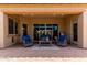 Cozy covered patio with comfortable seating, perfect for relaxing and enjoying the outdoors at 9448 W Villa Hermosa --, Peoria, AZ 85383