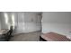 Bedroom with a bed, desk, and ample natural light showcasing a cozy space at 10351 W Deanna Dr, Peoria, AZ 85382
