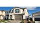 Beautiful two-story home featuring a gray roof, a well-kept lawn, and a spacious two-car garage at 10351 W Deanna Dr, Peoria, AZ 85382