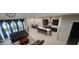 Elevated view of open-concept living with a kitchen, living, and dining space at 10351 W Deanna Dr, Peoria, AZ 85382