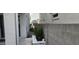 This side yard features a stone paver walkway, block wall, and decorative flowers at 10351 W Deanna Dr, Peoria, AZ 85382