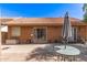 Private backyard with a large patio, ample seating, and space for outdoor enjoyment at 1214 W Sand Dune Dr, Gilbert, AZ 85233
