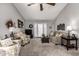 Comfortable living room with ample seating and French door access at 1214 W Sand Dune Dr, Gilbert, AZ 85233