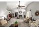 Spacious living room with a fireplace and comfortable seating arrangement at 1214 W Sand Dune Dr, Gilbert, AZ 85233