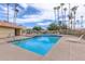 Community pool and spa deck area with plenty of lounge chairs at 1214 W Sand Dune Dr, Gilbert, AZ 85233