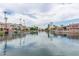 Scenic waterfront community with lush landscaping, boat docks and two story condos at 1214 W Sand Dune Dr, Gilbert, AZ 85233