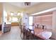 Charming dining area with a large table, wood flooring, and plenty of natural light at 1219 E Avenida Isabela --, Casa Grande, AZ 85122