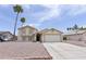 Charming two-story home featuring a well-maintained front yard and attached two-car garage at 1219 E Avenida Isabela --, Casa Grande, AZ 85122