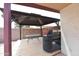 Backyard features a gazebo with dining furniture, providing a cozy outdoor space at 1219 E Avenida Isabela --, Casa Grande, AZ 85122