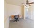 Cozy office space with vintage wooden desk and office chair, adjacent to the bedroom at 1219 E Avenida Isabela --, Casa Grande, AZ 85122