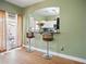 Bright breakfast nook with bar seating open to kitchen and sliding glass door to back yard at 14626 N 132Nd Ave, Surprise, AZ 85379