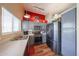 Modern kitchen featuring stainless steel appliances, stylish cabinets, and ample counter space at 16036 W Desert Bloom St, Goodyear, AZ 85338