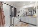 Beautiful bathroom features dual sinks, a soaking tub and a step in shower at 17461 W Molly Ln, Surprise, AZ 85387