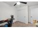 Comfortable bedroom with ceiling fan, plush carpet, and a closet with sliding doors at 17461 W Molly Ln, Surprise, AZ 85387