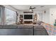 Inviting living room with large sectional sofa, media center, and neutral decor at 17461 W Molly Ln, Surprise, AZ 85387