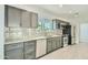 Modern kitchen with granite counters, stainless steel appliances, and ample cabinet space at 1930 E Missouri Ave, Phoenix, AZ 85016