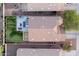 An aerial view showcases a well-maintained roof, a backyard oasis and neat landscaping of the property at 22259 N 102Nd Ln, Peoria, AZ 85383