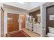 A spacious bathroom featuring double sinks, a walk-in shower, and plenty of storage at 2326 E Evans Dr, Phoenix, AZ 85022