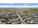 Expansive aerial view of a large neighborhood boasting well-maintained homes and scenic surroundings at 24138 S 220Th St, Queen Creek, AZ 85142