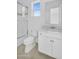 The bright bathroom features modern vanity with a marble countertop next to the bathtub at 24138 S 220Th St, Queen Creek, AZ 85142
