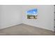 Bright bedroom offers a large window with exterior views at 24138 S 220Th St, Queen Creek, AZ 85142