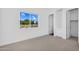 Bright bedroom features a large window with beautiful exterior views at 24138 S 220Th St, Queen Creek, AZ 85142