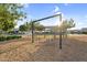 Community playground with swing set at 24138 S 220Th St, Queen Creek, AZ 85142