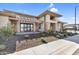 Spacious home featuring neutral stucco, stone accents and lush landscaping in the front yard at 24138 S 220Th St, Queen Creek, AZ 85142