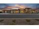 Striking modern home featuring desert landscaping and a large garage at 24138 S 220Th St, Queen Creek, AZ 85142