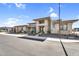 Beautiful two-story home boasts stone accents, desert landscaping, and an inviting facade at 24138 S 220Th St, Queen Creek, AZ 85142