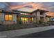Modern home with sleek architecture and professionally landscaped front yard at 24138 S 220Th St, Queen Creek, AZ 85142