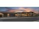 Attached three-car garage featuring clear glass panel doors at 24138 S 220Th St, Queen Creek, AZ 85142