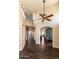 Spacious foyer with soaring ceilings, hardwood floors, and a view into the dining area at 2709 E Vista Dr, Phoenix, AZ 85032
