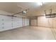 The large garage has built in cabinets and two garage doors at 2709 E Vista Dr, Phoenix, AZ 85032
