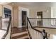A view of the open hallway with hardwood floors and white doors on the second floor at 2709 E Vista Dr, Phoenix, AZ 85032