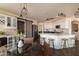 Bright open kitchen with stainless steel appliances, a large island, and stylish barstool seating at 2709 E Vista Dr, Phoenix, AZ 85032