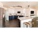 Spacious kitchen features a large island with seating, stainless steel appliances, and custom cabinetry at 2709 E Vista Dr, Phoenix, AZ 85032
