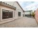 Outdoor patio with privacy fence, string lights, and a clear view of the pool at 2709 E Vista Dr, Phoenix, AZ 85032