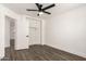Bedroom features a ceiling fan, wood floor and an open closet at 2710 S Shelby --, Mesa, AZ 85209