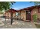 Cozy front patio with outdoor dining area and comfortable seating at 2907 W Townley Ave, Phoenix, AZ 85051