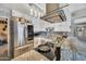 Beautiful kitchen with stainless steel appliances, granite counters, and decorative tile backsplash at 2907 W Townley Ave, Phoenix, AZ 85051