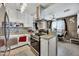 Stylish kitchen featuring granite countertops, stainless steel appliances, and ample cabinet space at 2907 W Townley Ave, Phoenix, AZ 85051